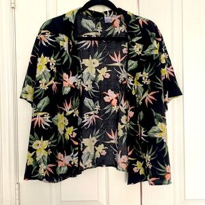 This Hawaiian shirt is a size large from H&M.